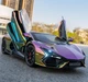 Коллекционная металлическая модель автомобиля Lamborghini Revuelto инерционная со светом, звуком и паром, фиолетовая 1:24 - изображение 1