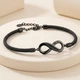 Браслет бесконечность со стразами черный женский на шнурке стильный браслет символ любви и связи - изображение 1