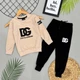 Дитячий костюм Dolce & Gabbana на хлопчика світшот+джогери) 134-140 см бежево-чорний - зображення 1