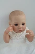 Кукла Реборн Reborn Doll 50 см, реалистичная винил-силионовая девочка пупс в одежде+аксессуары - изображение 5
