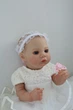 Кукла Реборн Reborn Doll 50 см, реалистичная винил-силионовая девочка пупс в одежде+аксессуары - изображение 7