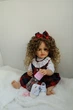 Лялька Реборн Reborn Doll 55 см, реалістична вініл-силіконова дівчинка кучеряшка в одязі з аксесуарами - зображення 2