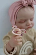 Кукла Реборн Reborn Doll 50 см, реалистичная винил-силиконовая девочка пупс закрытые глаза в одежде+аксессуары - изображение 6