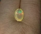 Эфиопский опал 2.06 Ct 12.60 x 7.80 x 4.80 MM (14498) - изображение 7