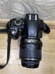 Дзеркальний фотоапарат Nikon D3100 (Nikon AF-S DX Zoom-Nikkor 18-55mm f/3,5-5,6G VR) - Б/В - зображення 3
