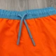 Пляжные шорты для мальчика Primark быстросохнущие с сеткой для плавания, оранжевые 98 см. - изображение 4