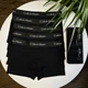 Чоловічі труси боксери Calvin Klein з білим написом набір 5 шт Чорний L - зображення 4