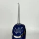 Ирригатор для полости рта 200 мл беспроводной аккумуляторный Oral Irrigator, портативный с 3 режимами работы и 4 сменными насадками для ухода за зубами, деснами и брекетами Синий, RGL-137-Blue - изображение 9
