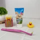 Набір для перших зубів від 0 до 3 років зубна паста Brush-Baby 50 мл та монопучкова щітка CS 1006 рожевий - зображення 1