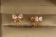 Серьги клипсы Xuping Jewelry Бантики 1,5 см золотистые - изображение 1