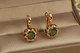 Серьги Xuping Jewelry Парфе с изумрудным камнем 2 см золотистые - изображение 1