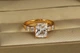 Кольцо Xuping Jewelry Большой прямоугольник с белым камнем р 20 золотистое - изображение 1
