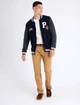 Мужской кардиган-бомбер U.S. Polo Assn. — Premium Cotton на молнии Full-Zip с контрастными рукавами, эффектным принтом и архивными патчами M темно-синий с серым - изображение 3