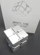Нескінченний кубик RESTEQ, антистрес Infinity Cube 38 мм. Іграшка-антистрес з алюмінієвого сплаву - зображення 2