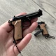 Брелок розбірний пістолет Антистрес M92 BERETTA чорного кольору, іграшка з металу та пластику - зображення 3