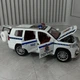 Іграшкова поліція Toyota Land Cruiser Prado металева модель 1:24 інерційна машинка зі світлом і звуком відкриваються двері - зображення 6