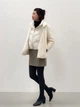 Теплый жилет женский UNIQLO 956211477 L Молочный (1159859660) - изображение 10