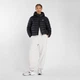 Жіноча чорна куртка New Balance Sport Essentials Hooded Puffer 34 (XS) (WO53500BK) - зображення 2