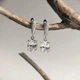 Серебряные серьги с фианитами (2207702) - изображение 2
