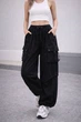 Женские широкие карго штаны oversize с карманами S — модные трендовые брюки свободного кроя в стиле streetwear - изображение 1