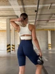 Спортивные женские велосипедки Soft SQ с перекрестным поясом и эффектом push up для фитнеса и йоги Однотонные Бесшовные с утяжкой V-пояс XS-S Темно-синие (SQVL02S) - изображение 4