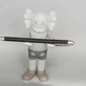 Статуэтка KAWS Companion серого цвета 18 см — дизайнерская фигурка для интерьера, коллекционная игрушка в стиле арт-той - изображение 5
