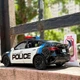 Дитяча іграшкова машина Tesla Model Y Police 1:24 металева інерційна зі світловими ефектами сиреною та зарядною станцією - зображення 6