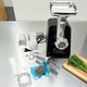 Електром'ясорубка Domotec MS з насадками для ковбас та терками с соковыжималкой 4500 Вт мясорубка електрична з реверсом чорна (6ZOZ) - зображення 4