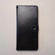 Чохол книжка Idewei для Xiaomi Redmi Note 10 Pro із застібкою чорний - зображення 1