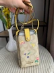 Сумочка на телефон жовта COACH North/South Phone Crossbody Signature Canvas - зображення 1