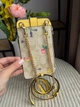 Сумочка на телефон жовта COACH North/South Phone Crossbody Signature Canvas - зображення 8