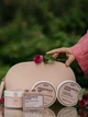 Набор для спа-ухода за телом Ukrainian Rose: Мыло Ukrainian Rose Moisturizing & Toning Soap 100 г + Очищающий мусс Ukrainian Rose Cleansing 200 мл + Антицеллюлитный скраб Ukrainian Rose 200 мл + Крем-баттер Ukrainian Rose 120 мл + Косметичка - изображение 2