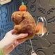 Брелок плюшевая капибара с мандаринкой 12 см хомяк мягкая игрушка capybara крутящимся механическим хвостом - изображение 3