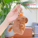 Брелок плюшевая капибара с мандаринкой 12 см хомяк мягкая игрушка capybara крутящимся механическим хвостом - изображение 6