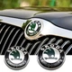 Эмблемы знаки Шкода Skoda 89 мм 79 мм Octavia Tour A5 Fabia Rapid Superb 5J0853621AAUL 5JA8536872ZZ зеленые - изображение 1