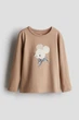 Футболка-лонгслив хлопковая з принтом для девочки H&M 0922700-114 134-140 см (8-10 years) Коричневый - изображение 1