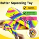 Іграшка-антистрес Squishy Rainbow Butter Stick 13 см, м’яка сквіші паличка масла з повільним відновленням форми - зображення 7