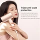 Фен для волос Doco negative ion hair dryer soft and fast dry hair care 1800W Китайськая вилка Small Milk (AN001SM) - изображение 4