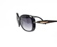 Очки солнцезащитные женские Prada SPR04Z 1AB-09S - изображение 4