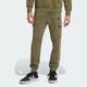 Чоловічі штани AOP Colourblock adidas JM1714 (S) зелений (4068806487124) - зображення 1