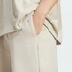 Женские спортивные брюки Essentials Small Logo Feel Cozy Open-Hem adidas JC5922 (2XS) бежевый (4067891969232) - изображение 4
