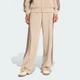 Женские спортивные брюки FIREBIRD LOOSE adidas KD3660 (L) бежевый (4068818729137) - изображение 1