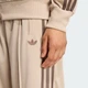 Женские спортивные брюки FIREBIRD LOOSE adidas KD3660 (L) бежевый (4068818729137) - изображение 4