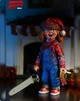 Коллекционная фигурка Чаки Holiday Edition / Chucky Ultimate Action Figure – фигурка ужасов с аксессуарами, сменными головами и оружием, 15 см - изображение 11