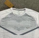 Чоловіча спортивна футболка з принтом Nike біла XL F77654309 - изображение 3