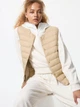 Теплый жилет женский UNIQLO 780581515 XS Бежевый (1159861850) - изображение 1