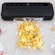 Вакуумный упаковщик Food Vacuum Sealer 65 кПа с резаком и пакетами, чёрный - изображение 2