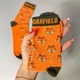 Жіночі шкарпетки високі 1 пара з малюнком "Garfield" 36-41 р бавовняні оранжеві - зображення 2
