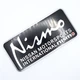 Эмблема алюминиевая Nismo Nissan 9,0*4,2 см чёрный - изображение 3