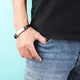 Браслет для сина на руку з індивідуальним гравіюванням регульований чоловічий аксесуар плетений сімейний оберіг персональний пам’ятний іменний подарунок зі змістом сину чоловікам від батьків еко шкіра нержавіюча сталь 21 см чорний у подарунковій коробці - изображение 8